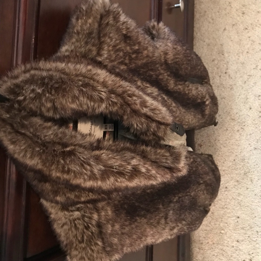 Beautiful never worn Faux fur Vest